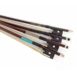 Four nickel mounted violin bows stamped Dodd, Tourte, Metropole-Brand and another indistinctly