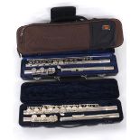 Jazz metal flute, case; together with a Protec Music slimline flute case and a Buescher metal flute,