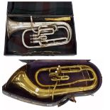 Conn brass forward-facing euphonium, cased; also a Boosey & Co silver plated baritone horn, cased (