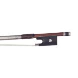 Good silver mounted violin bow, unstamped, the stick round, the ebony frog inlaid with pearl eyes