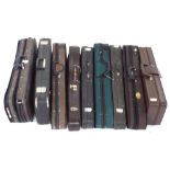 Three oblong violin cases and six violin shaped cases (9)