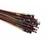 Bundle of violoncello and violin bows, some stamped