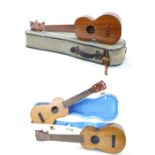 Vintage Kumalae koa wood ukulele, within original canvas case; together with a Skylark ukulele and a