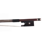 Silver mounted violin bow branded J. Reynolds, the stick octagonal, the ebony frog inlaid with