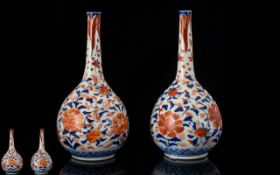 A Pair Of Imari Pattern Onion Form Bud V