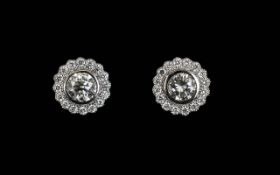 A Pair Of 18ct White Gold And Diamond Se