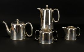 Plated Tea And Coffee Set Of plain form to include coffee pot, teapot twin handle sugar bowl and
