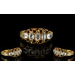 A Victorian 15ct Gold Dress Ring Set with clear faceted stones, fully hallmarked for Chester 15.