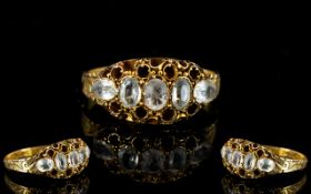 A Victorian 15ct Gold Dress Ring Set with clear faceted stones, fully hallmarked for Chester 15.