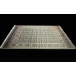 A Very Large Woven Silk Bokhara Carpet Ornate silk carpet with traditional lozenge and geometric