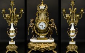 A 20th Century Brass And Marble Cased Clock Garniture In the Louis XV style,