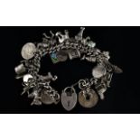 Antique Curb Silver Bracelet Loaded with 40 Silver Vintage Charms, All Marked for Silver,
