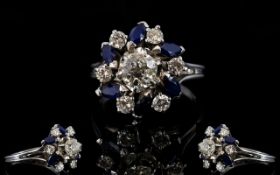 18ct White Gold Diamond & Sapphire Cluster Ring, Central Diamond Surrounded By 6 Further Round Cut