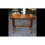 A Victorian Mahogany Three-tier Metamorphic Buffet/Dumb Waiter with moulded edge to the rounded