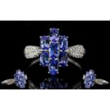 Tanzanite Cluster 9ct White Gold Ring with natural white zircon accent shoulders,