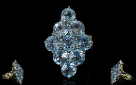 Sky Blue Topaz Statement Ring, 13cts of round cut sky blue topaz, over nine large stones in a