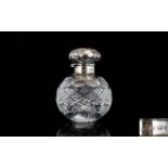 Queen Elizabeth II Silver Topped / Cover Cut Glass Perfume Bottle of Globular Form,
