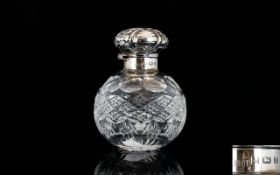 Queen Elizabeth II Silver Topped / Cover Cut Glass Perfume Bottle of Globular Form,