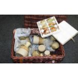 A collection of ceramics in a hamper to include a boxed set of six onyx glasses,