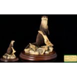 Border Fine Arts Handmade Figure 'Scenting the Air' raised on circular mahogany stepped wooden base.
