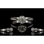 18ct White Gold Attractive Illusion Set Single Stone Diamond Ring, Colour - Good. Diamond Size 0.