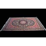 A Very Large Woven Silk Carpet Keshan rug with cobalt blue ground and traditional Middle Eastern