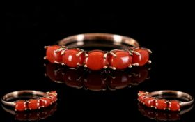 Natural Coral Band Ring, five oval cabochons of natural coral from the Mediterranean,