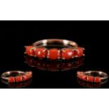 Natural Coral Band Ring, five oval cabochons of natural coral from the Mediterranean,