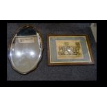 Antique Mirror Oval bevelled glass mirror in undulating frame with chain hanging detail to back,