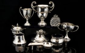 A Mixed Collection Of Silver And Metal Items To include three twin handle trophies, inkwell,