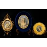A 20th Century Portrait Miniature Circa 1940's Housed in blue velvet and gilt oval fame depicting