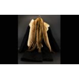 Astrakhan Black Coat with cream mink fur collar.