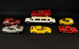 A Mixed Collection Of Model Cars Seven items in total to include Burago Lamborghini,