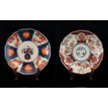 A Pair Of Japanese Imari Pattern Plates Circa early 19th century, fluted edge,