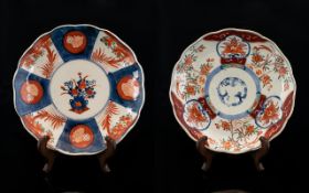 A Pair Of Japanese Imari Pattern Plates Circa early 19th century, fluted edge,