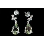 Green Amethyst Pear Drop Earrings, each earring comprising a 2.