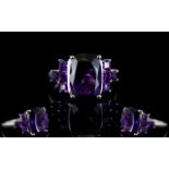 Amethyst Cushion and Square Cut Ring, an elongated cushion cut solitaire amethyst of 6cts,