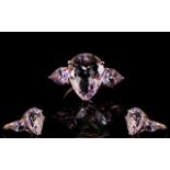 Rose de France Amethyst Pear Cut Ring, a 7.