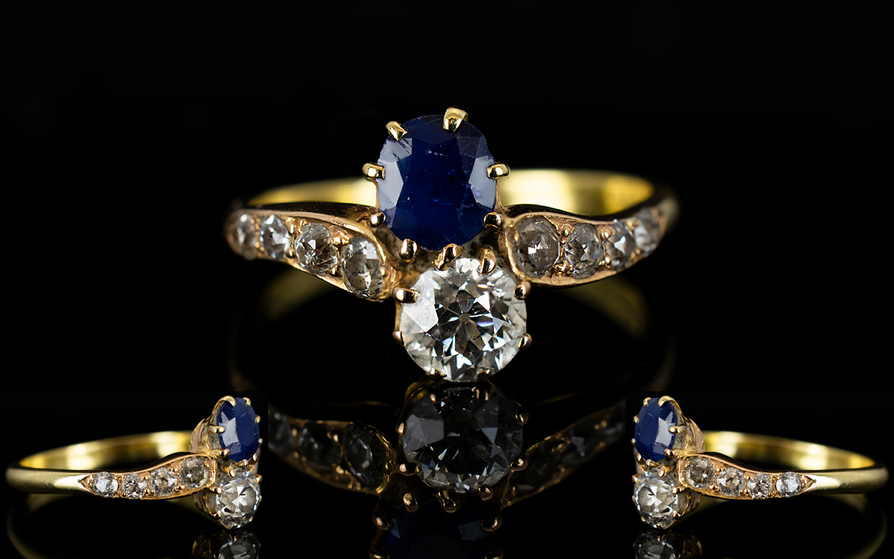 18ct Yellow Gold - Two Stone Sapphire and Diamond Set Dress Ring of Attractive Form.