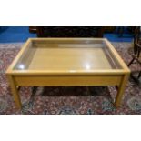 Contemporary Glass Topped Coffee Table Beech effect table with integral drawer and glass top.