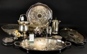 A Mixed Collection Of Plated Items To include two large ovoid trays, white metal mesh basket,