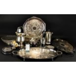 A Mixed Collection Of Plated Items To include two large ovoid trays, white metal mesh basket,