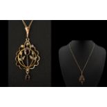 Victorian Period - 9ct Gold Garnet and Seed Pearl Set Open worked Pendant Drop of Attractive Form