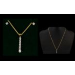A 9ct Gold And Diamond Contemporary Pendant Necklace and Earrings Comprising diamond set stud