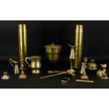 A Mixed Collection Of Brass Items To include two shell cases, bud vase,