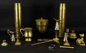 A Mixed Collection Of Brass Items To include two shell cases, bud vase,