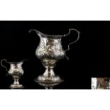 George III Silver Cream Jug with Embossed Floral Decoration to Body of Jug.