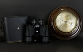 A Early - Mid 20th Century Barometer Circular form with brushed metal dial and mahogany case.