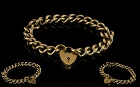 9ct Solid Gold - Unisex Curb Bracelet with Attached 9ct Gold Shield Shaped Padlock and Safety Chain