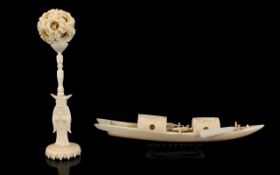 Chinese Late 19th Century Carved Ivory Puzzle Ball with carved and figural stand. The whole standing